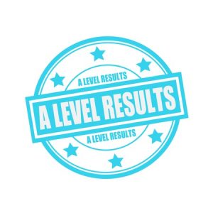 47643323 - a level results white stamp text on circle on blue background and star