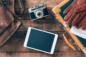 vintage camera next to tablet