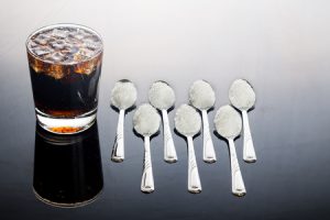 amount of sugar in a small glass of coca cola