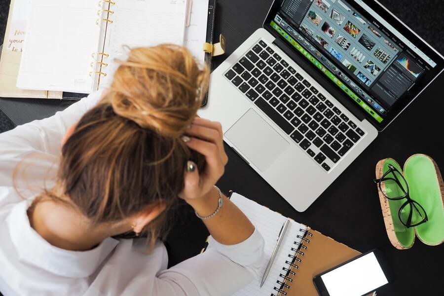 woman stressed at laptop