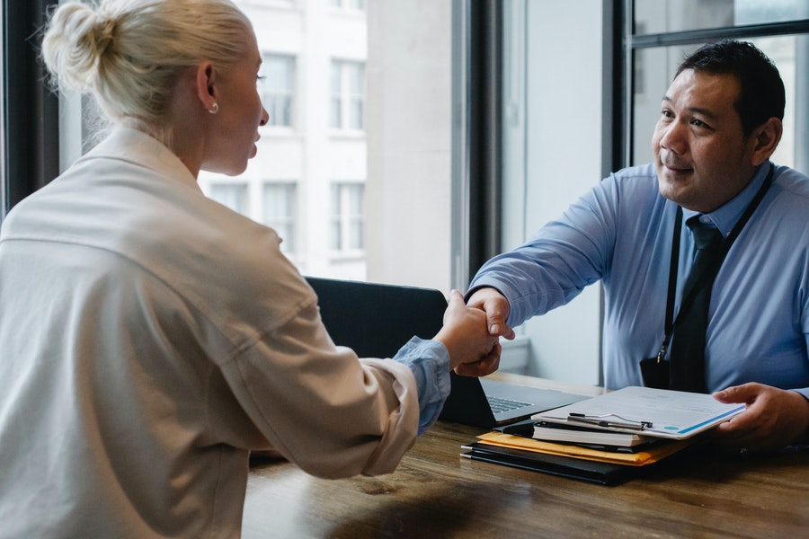 a teacher signing with new jobs after teaching