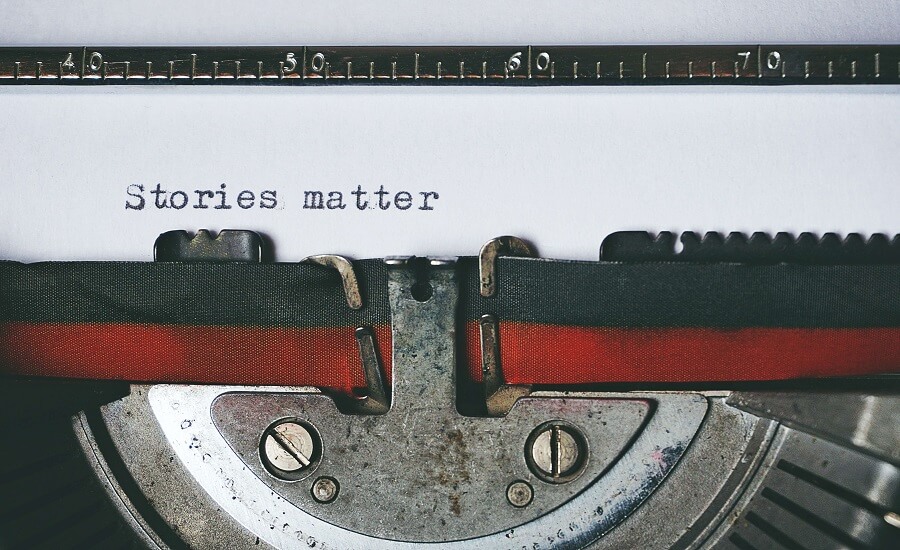 black and red typewriter spelling stories matter