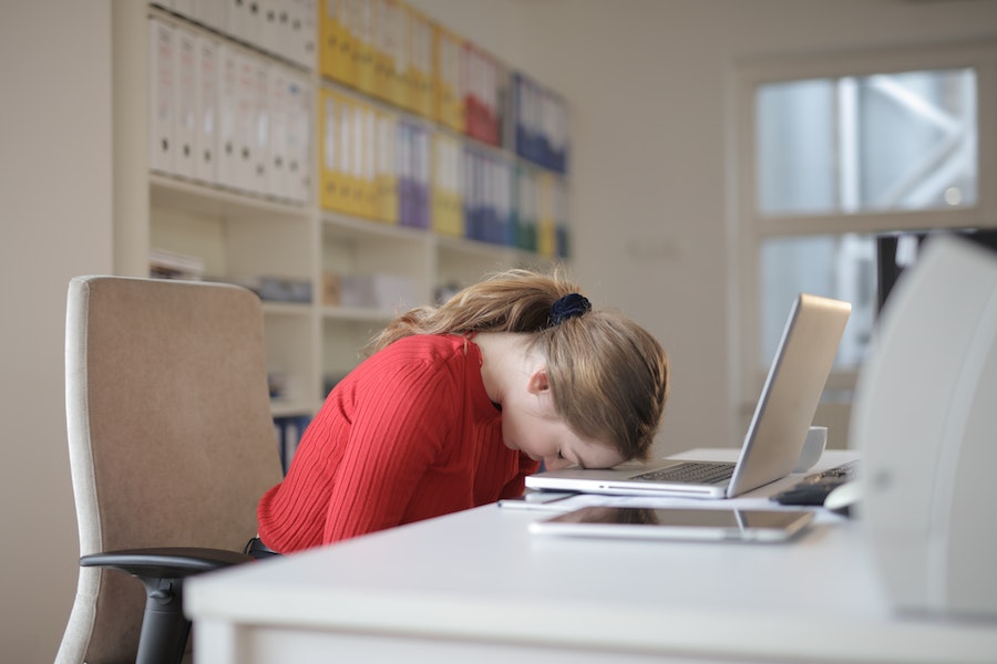 exhausted woman ready to hand in notice