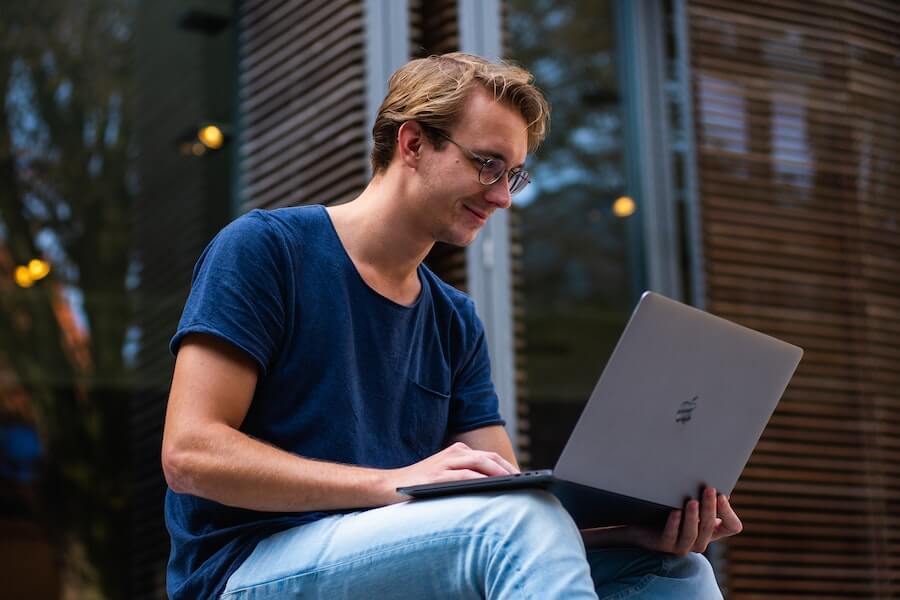 man studying on his laptop without a-levels 