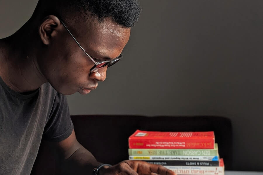 man doing further reading for his course without a-levels 