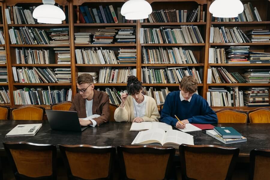 university students working in a library