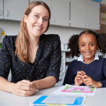 Female teacher with a female student