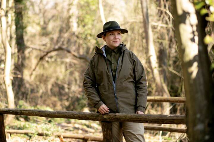 park ranger looking out across the woods