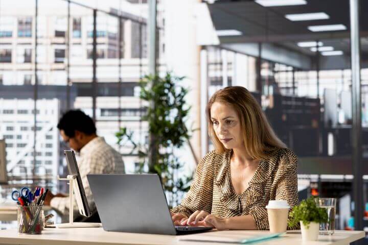 woman focused at work in an office 
