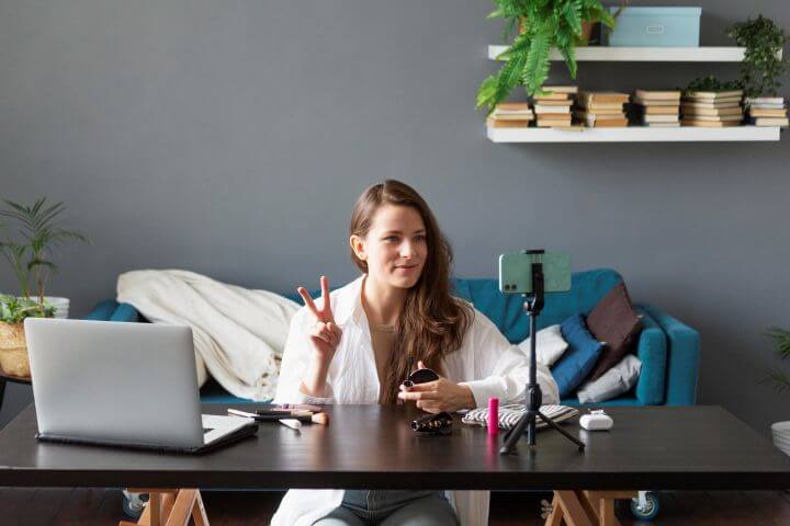 woman making videos on smartphone