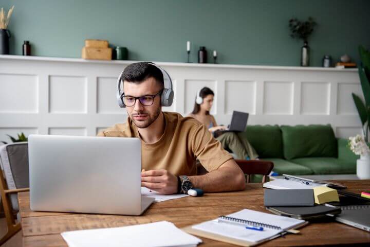 young man working on computer