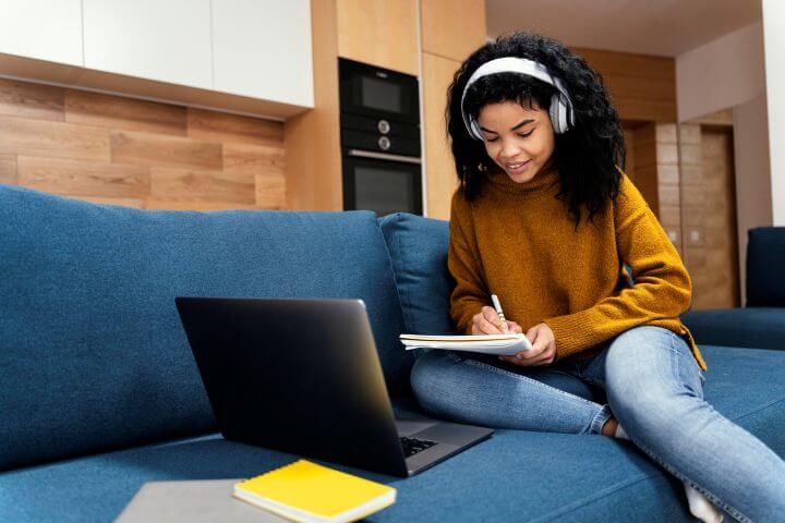 young woman taking online learning classes