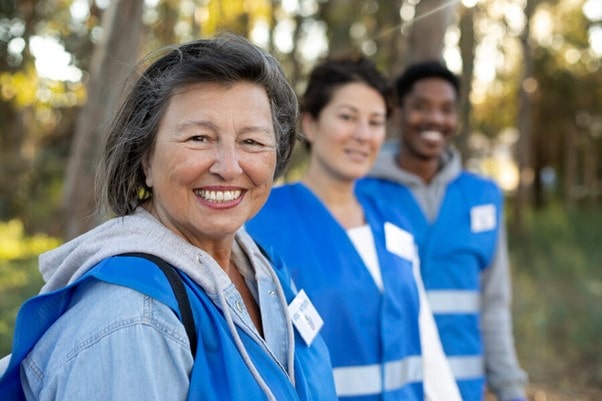 3 social workers smiling