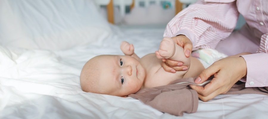 baby on bed