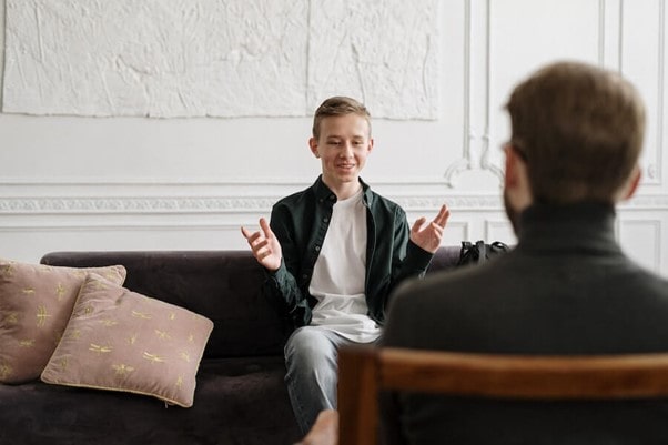 child during a life coaching session looking happy