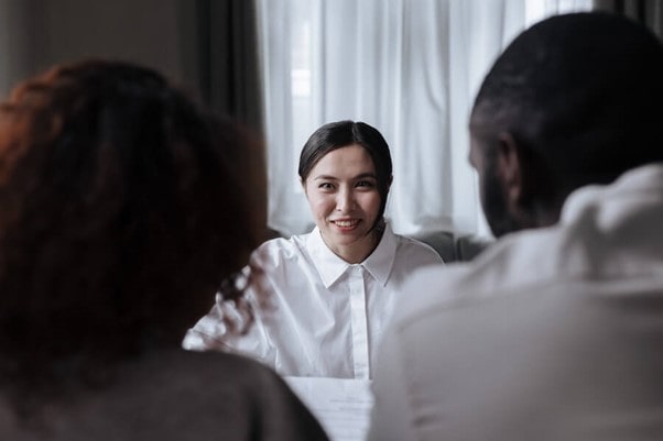 social worker speaking to couple